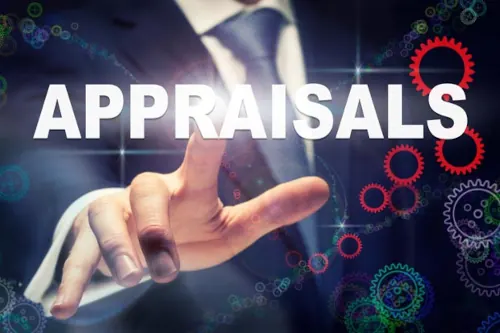 A man in a suit points toward the word "appraisals" with gears displayed on either side.