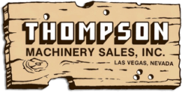 A wooden brown plaque featuring Thompson Machinery Sales, Inc. prominently in the center, with Las Vegas, Nevada displayed in the corner.
